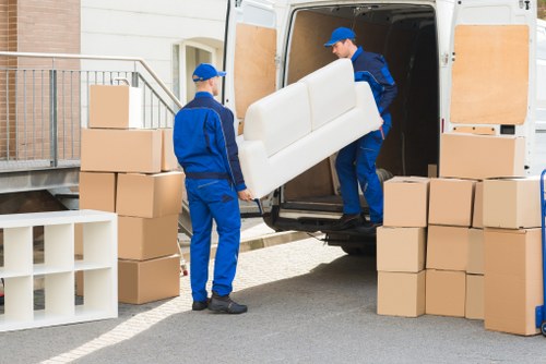 Team loading household items into a removals van near Stockwell