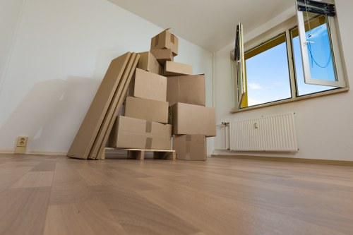 Organised moving day packing in a Stockwell property with labelled boxes