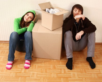 Movers loading household furniture for a Stockwell relocation