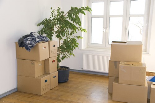 Local office movers packing business equipment for a Stockwell relocation