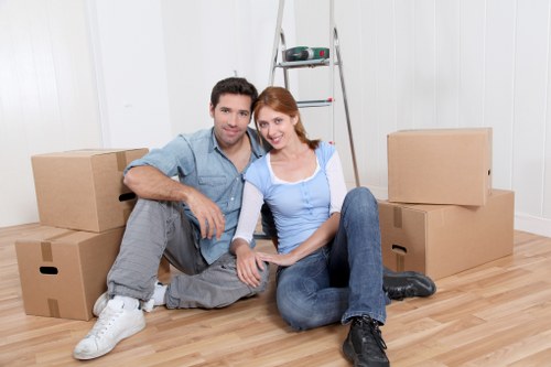 Trained movers handling furniture with care during a Stockwell move