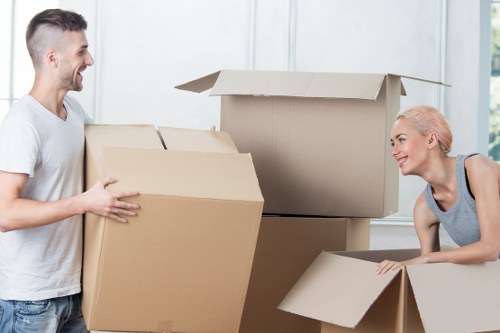 Worker checking packed items and load stability